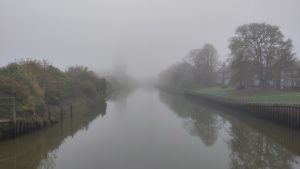 October. 
River Witham, Boston from the Grand Sluice bridge looking towards St Botolph's (The Stump) shrouded in mist, 25/10/2024&nbsp;Select this image to see a larger version. 